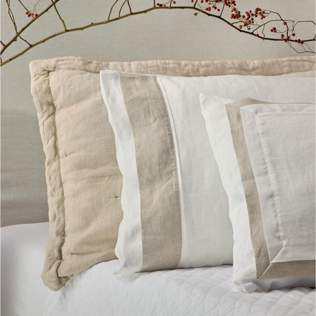 Shams Corner View of BOVI Marbella Bedding in White and Flax colors