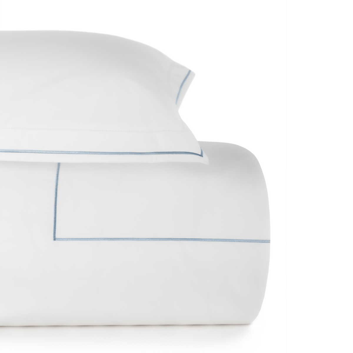 Closeup of White and Ocean Blue BOVI Sierra Bedding Duvet Set