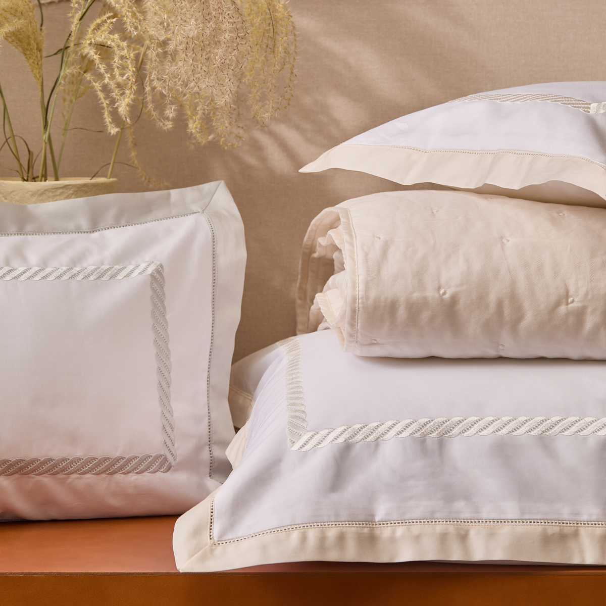 Stack of BOVI Simone Bedding Collection in different colors