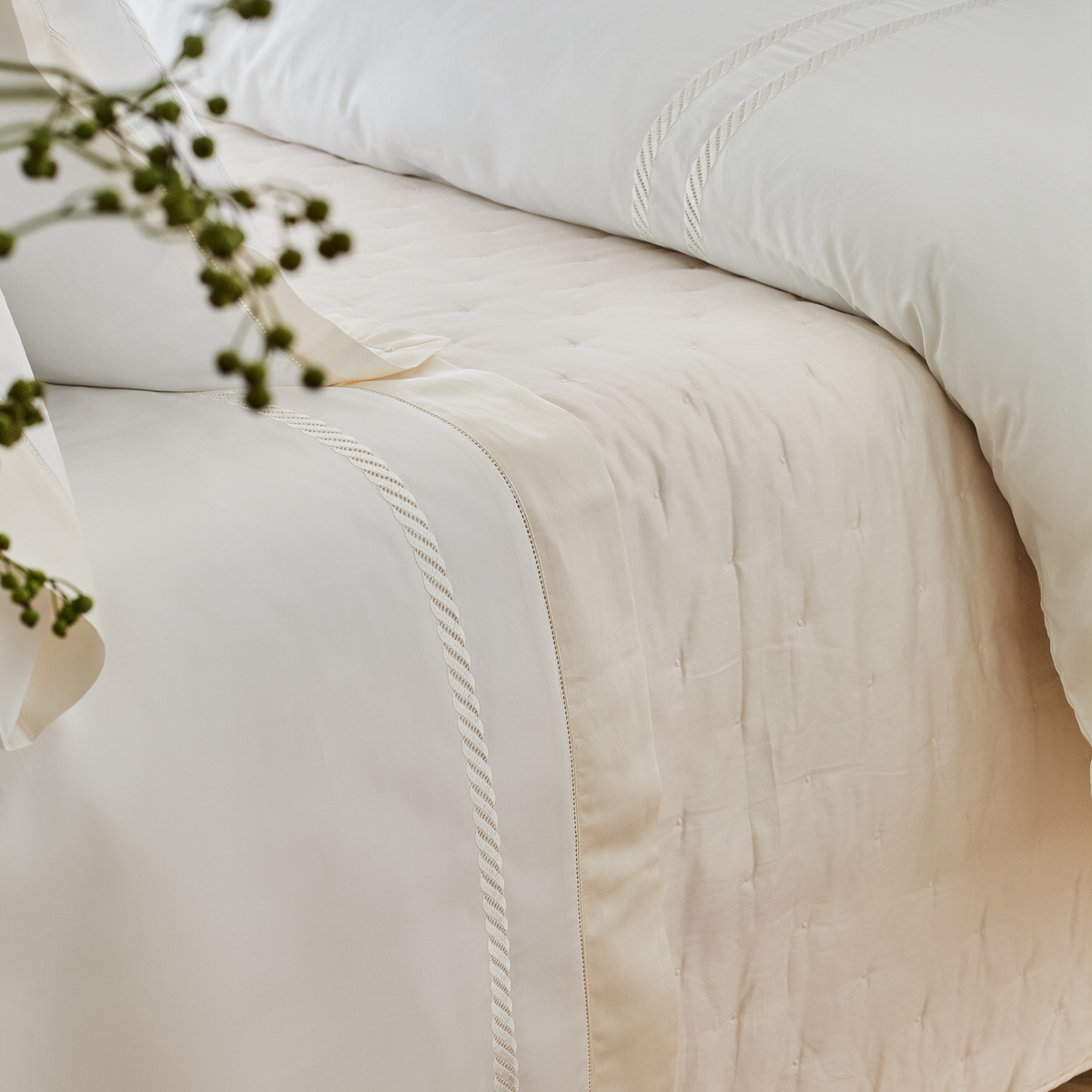 Closeup View of BOVI Simone Bedding with White and Ivory color