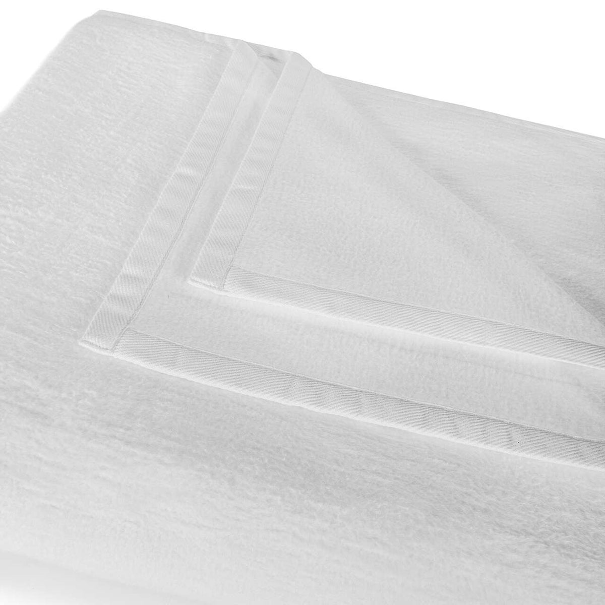 Close-up of BOVI Finnley white fabric with a subtle pattern on a white background