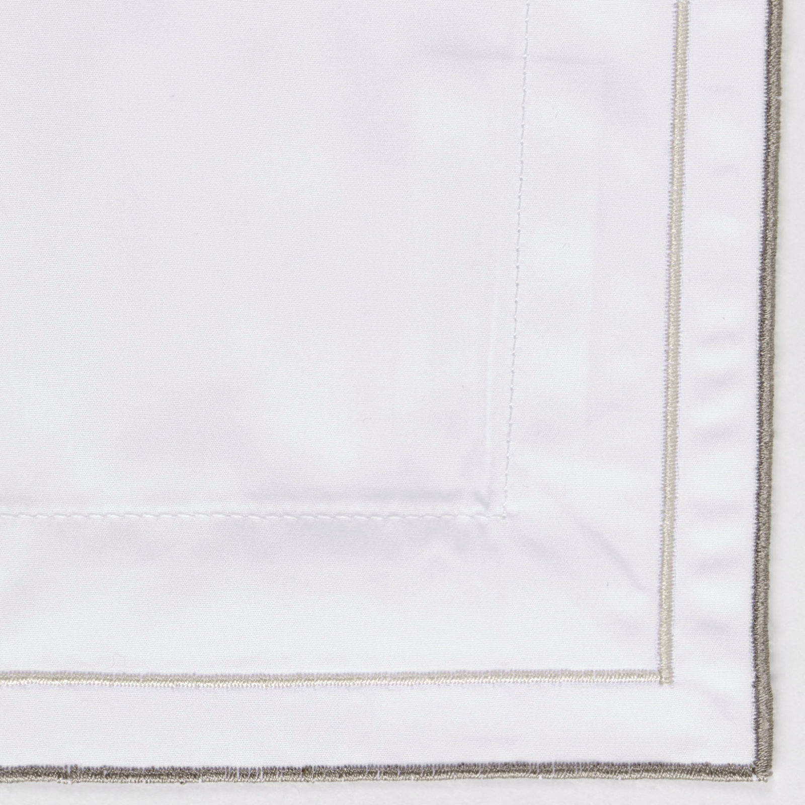 Lifestyle Shot of Celso de Lemos Areo Bedding with Eucalyptus Swatch