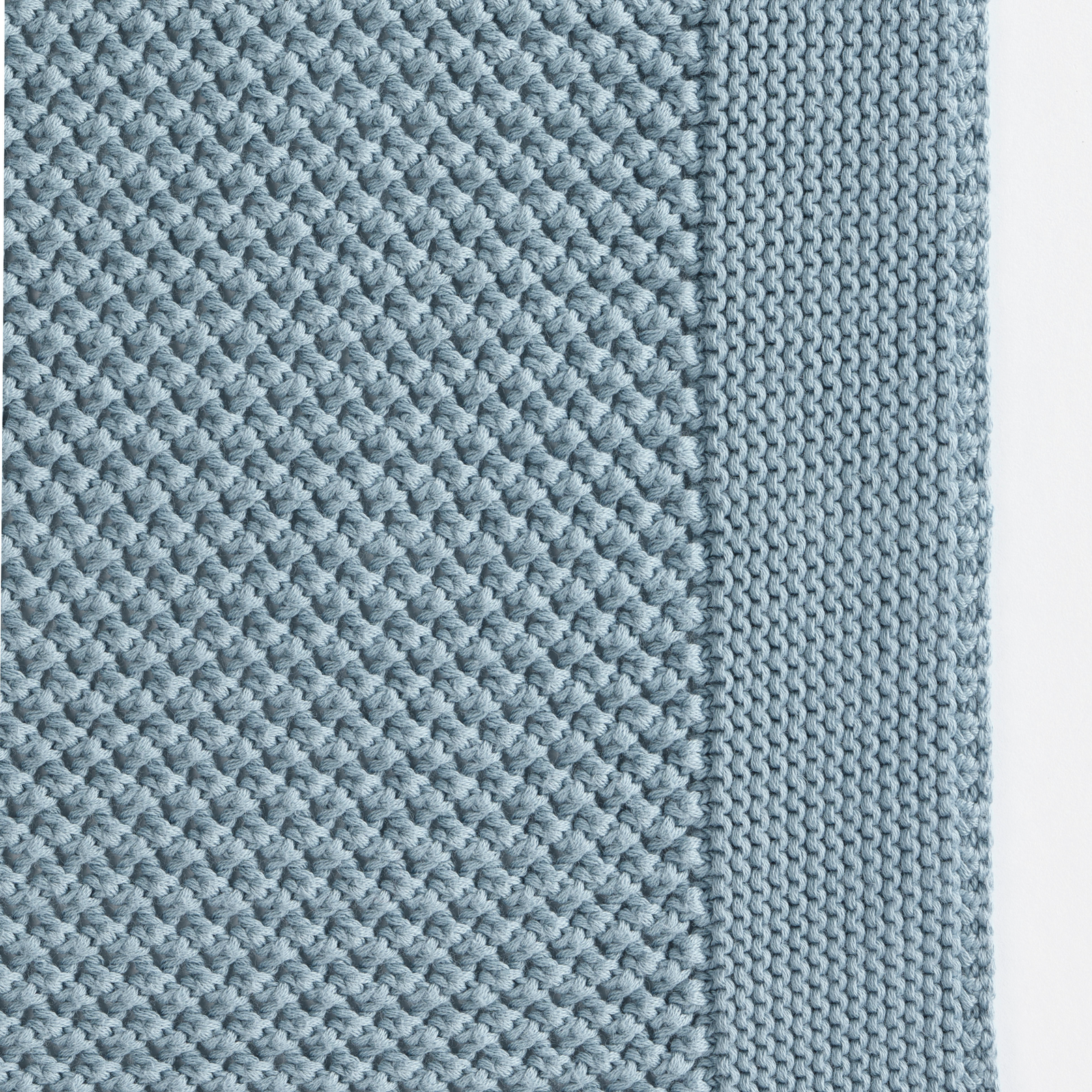 Celso de Lemos Balade Throw in Atlantic Color on a Bed