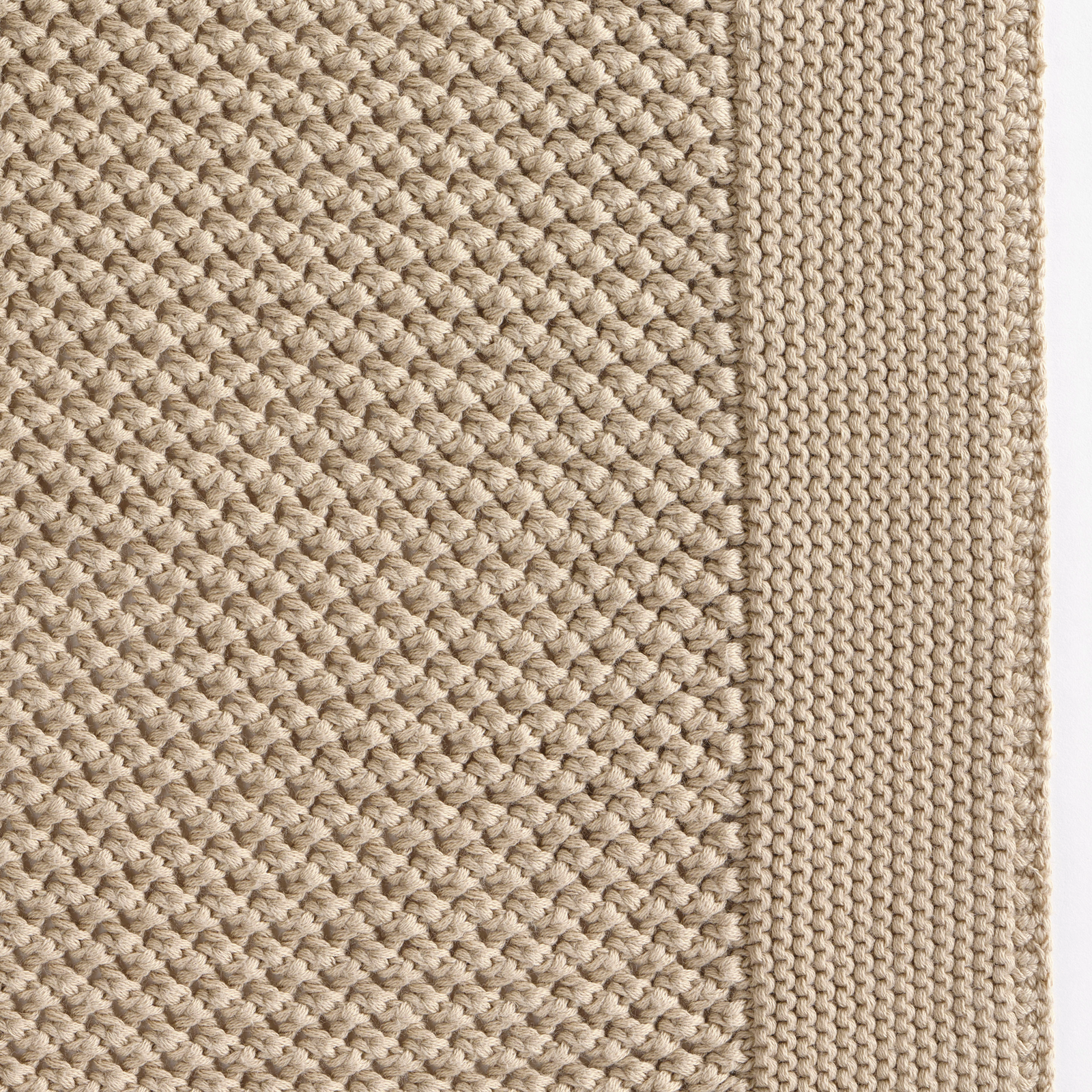 Celso de Lemos Balade Throw in Linen Color on a Bed