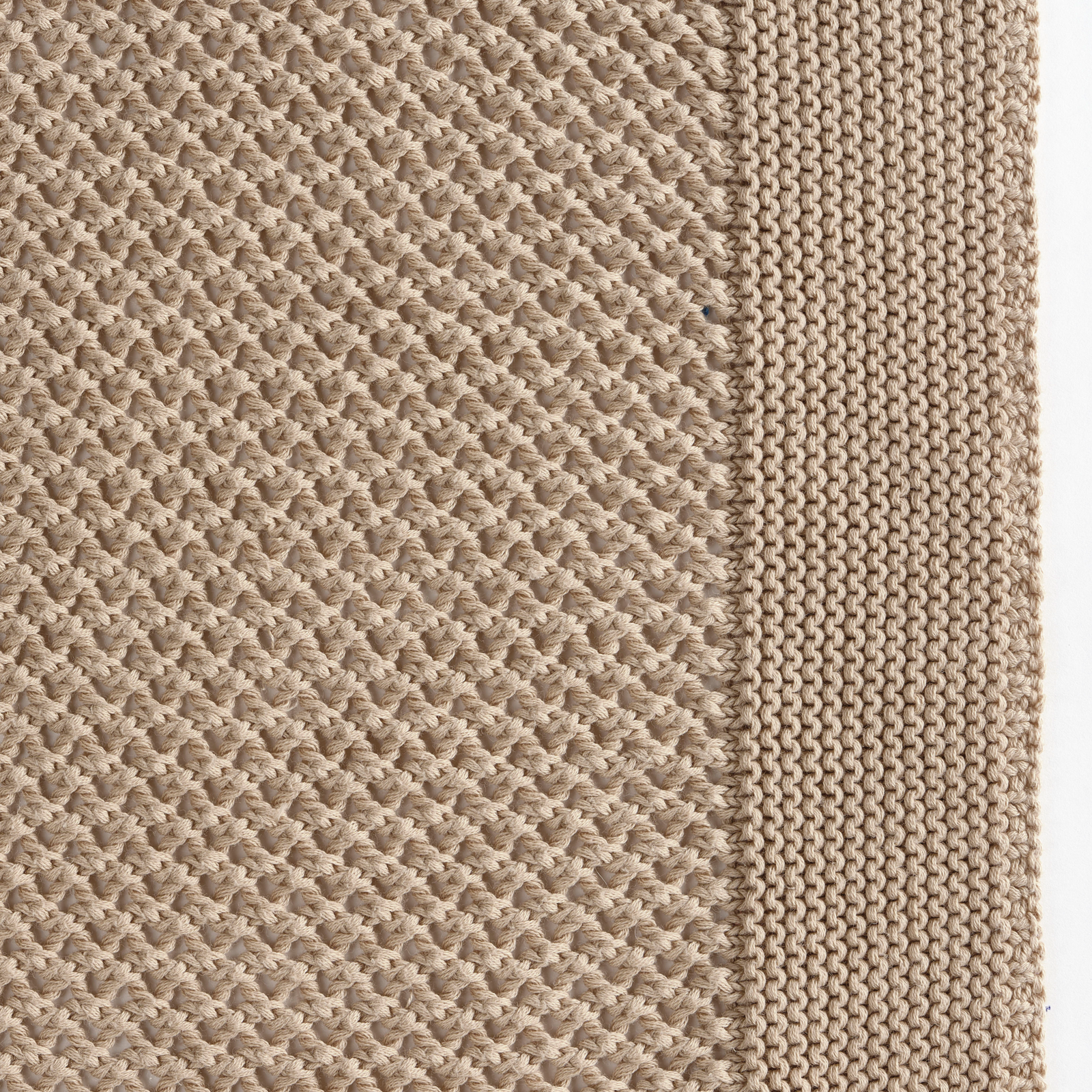 Celso de Lemos Balade Throw in Powder Color on a Bed