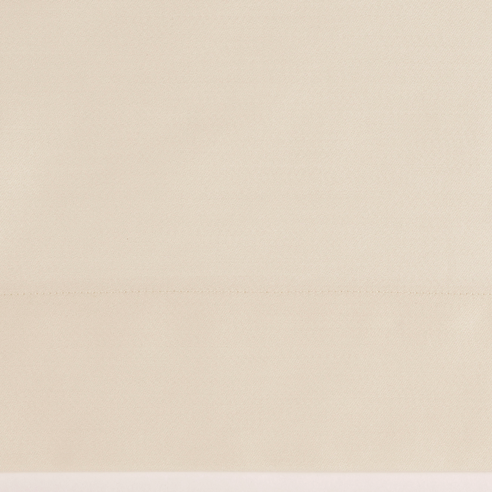 Corner Shot of Full Bed in Celso de Lemos Capela Collection in Brightly Lit Room