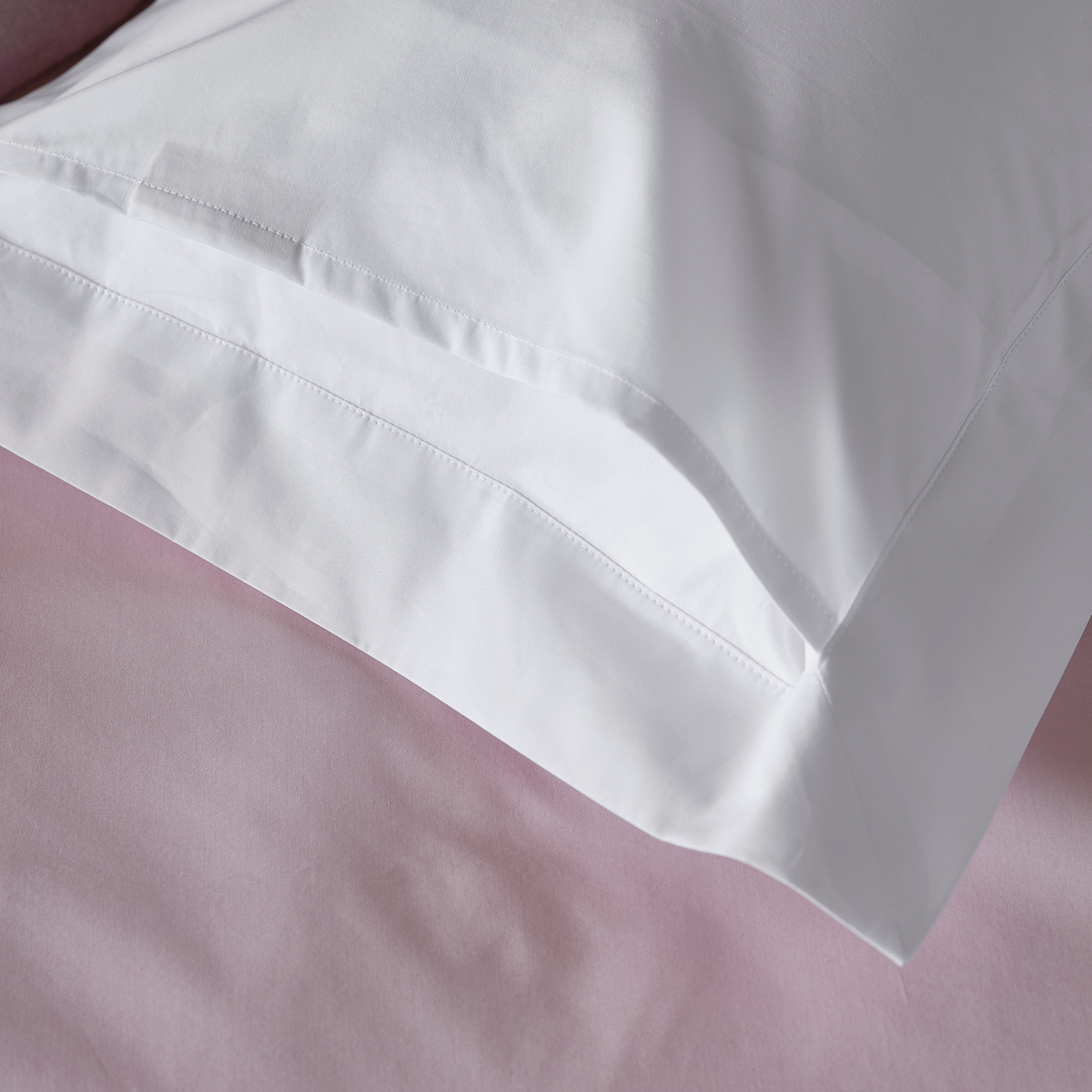 Corner Lifestyle Shot of Envelope Pillowcase of Celso de Lemos Bourdon Bedding