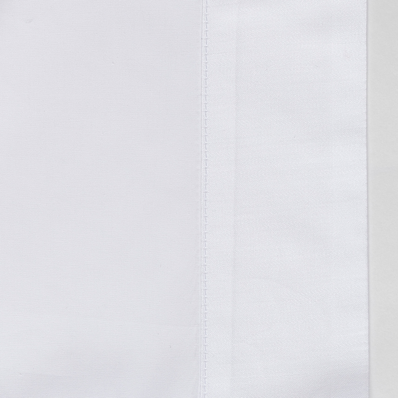 Full Bed Dressed in Celso de Lemos Hella Bedding with White Colored Swatch