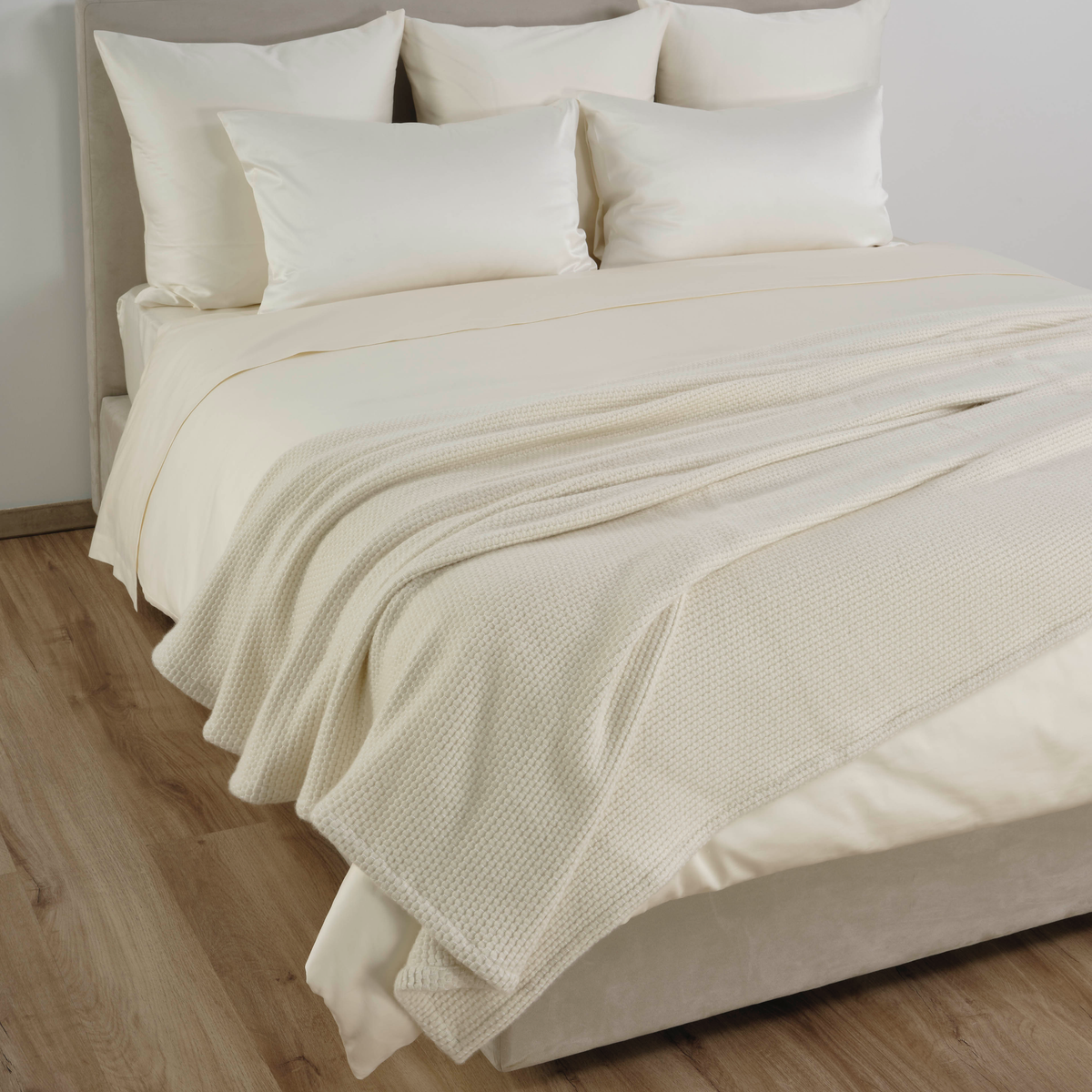 Celso de Lemos Himalaya Throw in Naturel Color on a Bed