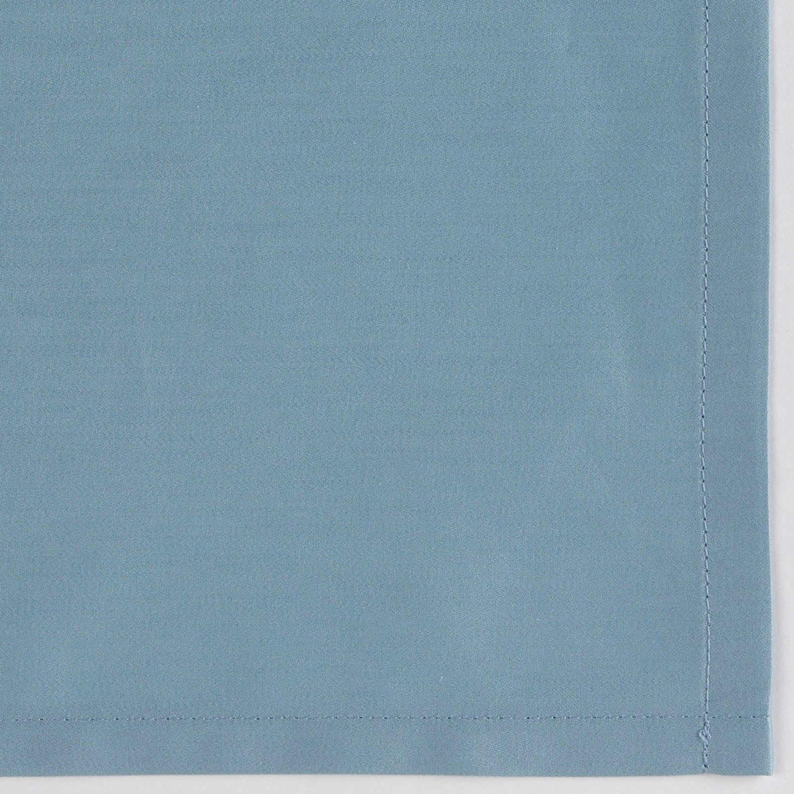 Full Bed Dressed in Celso de Lemos Secret Bedding with Atlantic Colored Swatch