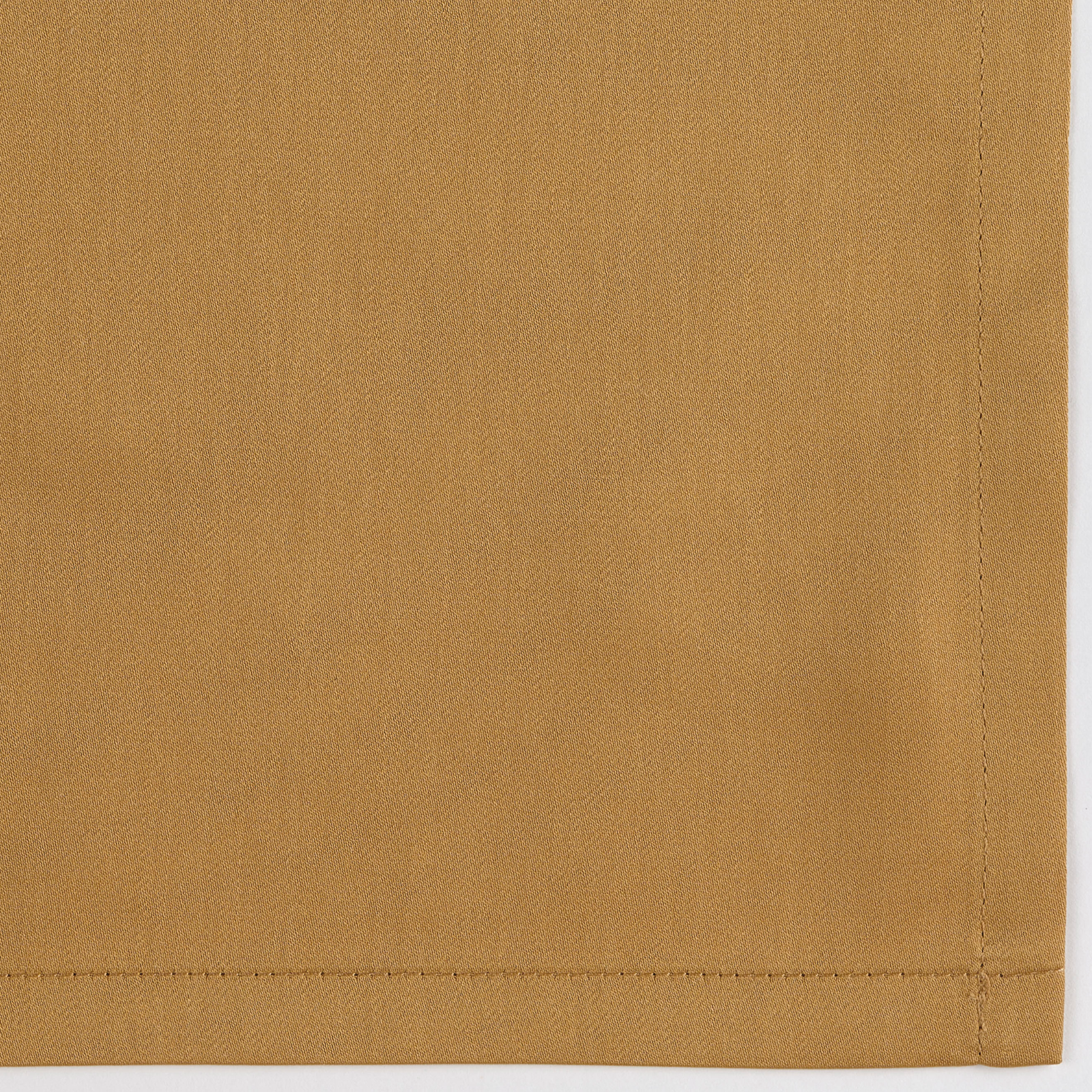 Full Bed Dressed in Celso de Lemos Secret Bedding with Bright Colored Swatch