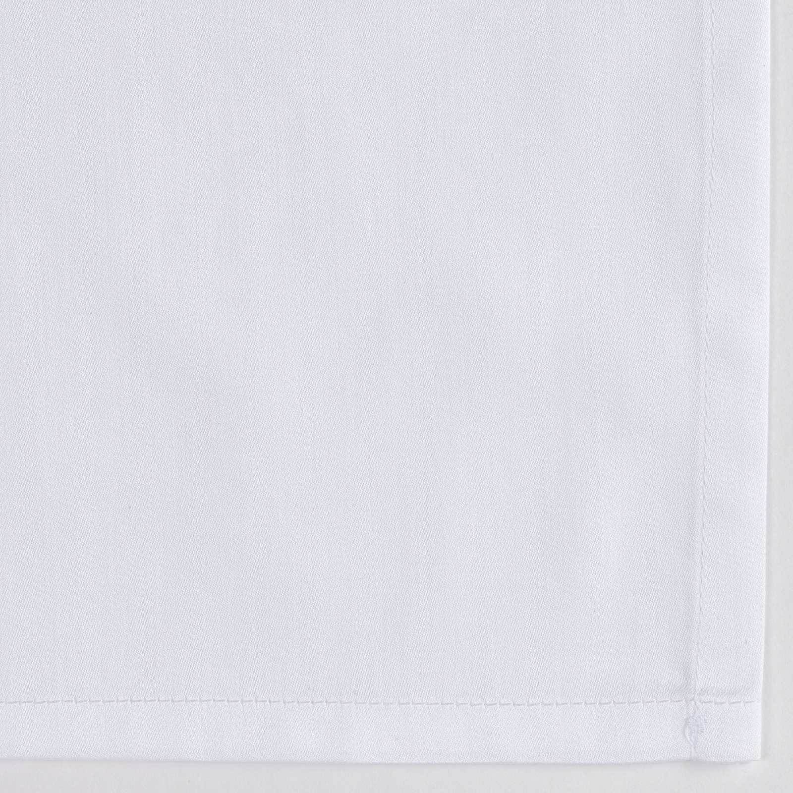 Full Bed Dressed in Celso de Lemos Secret Bedding with White Colored Swatch