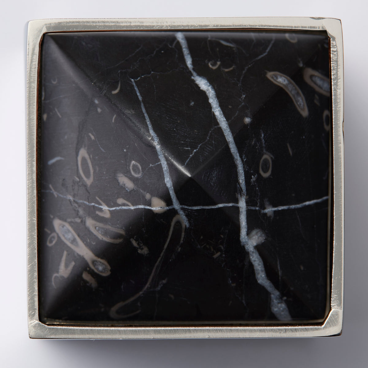 Close Up Image of Sferra Cestia Napkin Ring in Silver/Black Accent