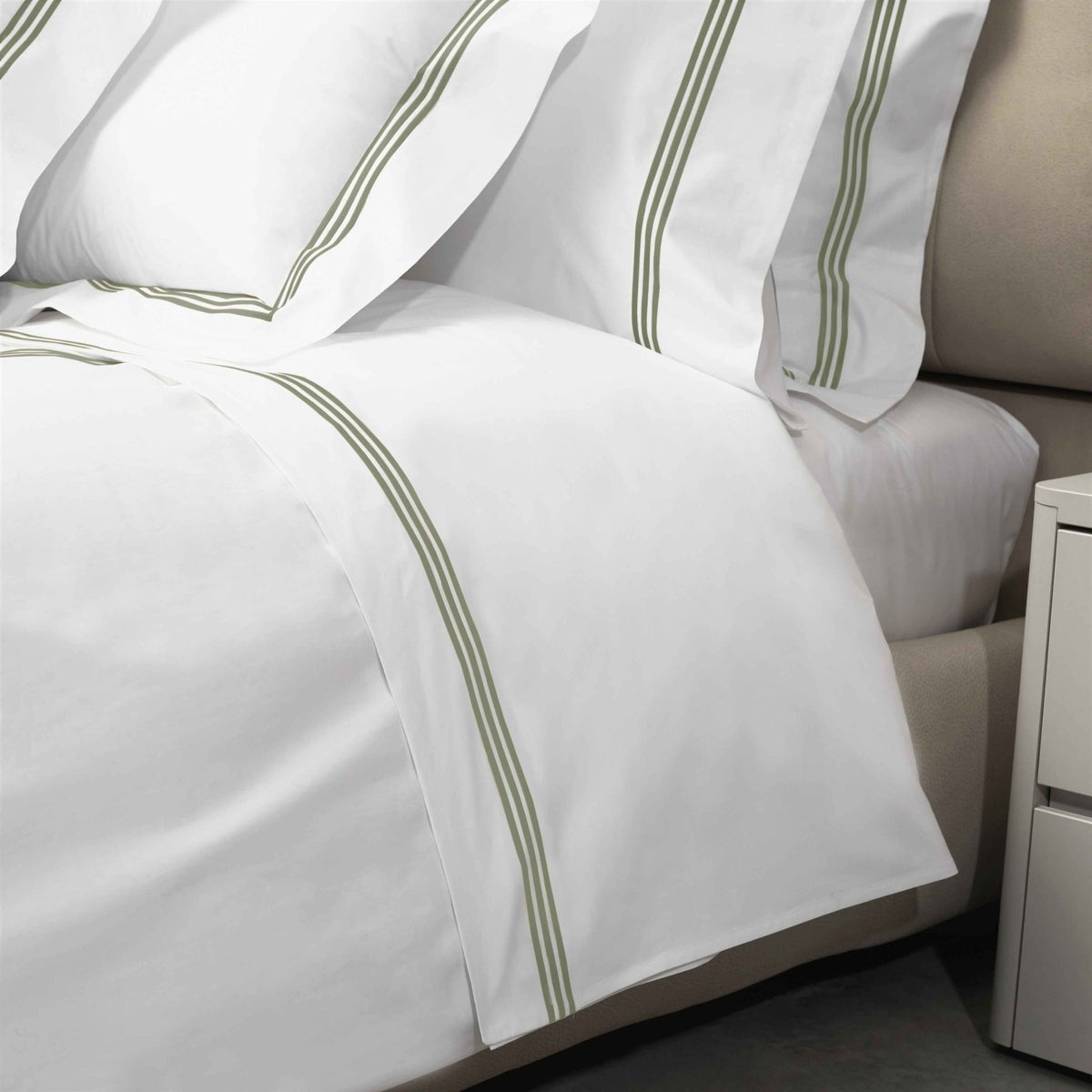 Closeup View of Signoria Platinum Percale Bedding in White/Olive Green Color