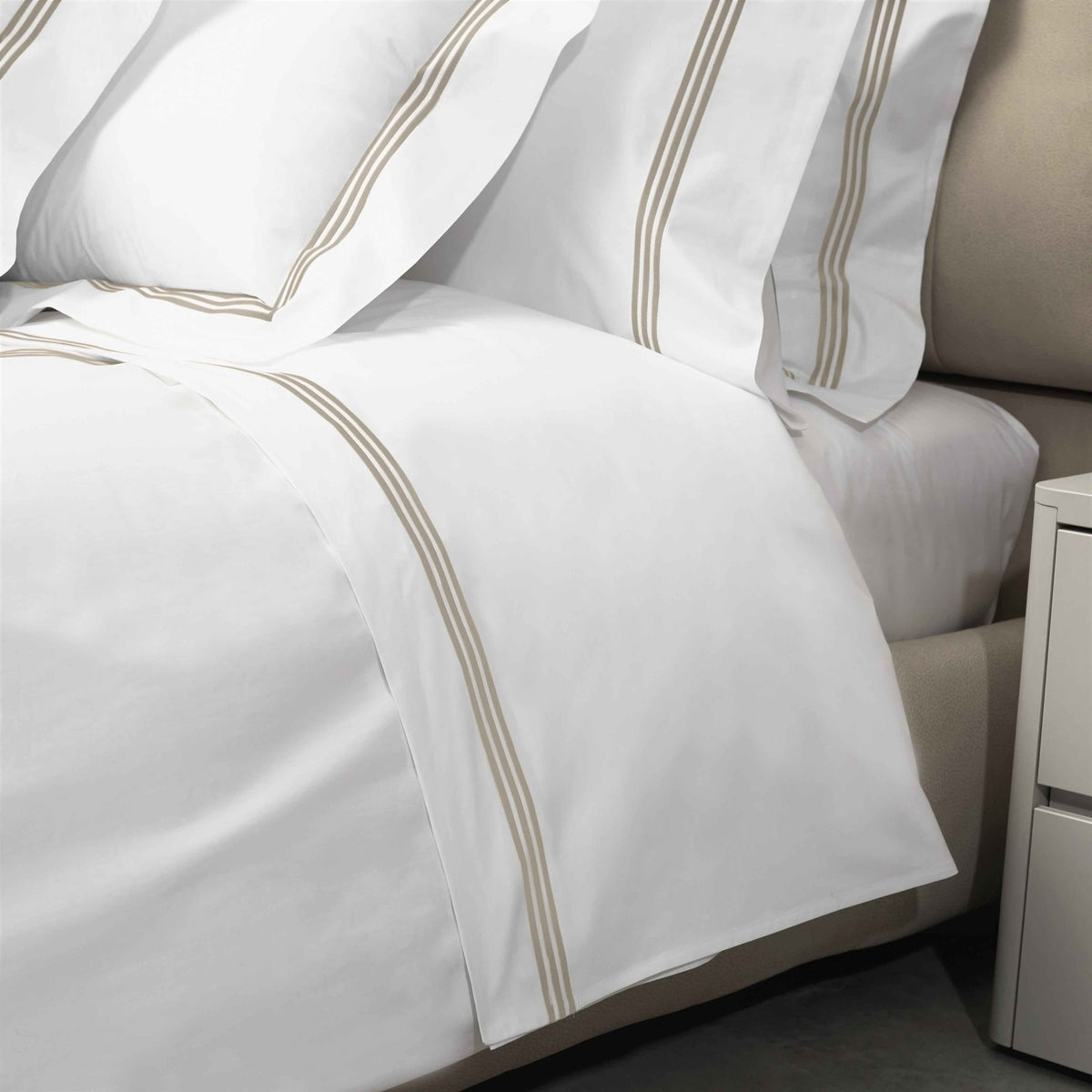 Closeup View of Signoria Platinum Percale Bedding in White/Taupe Color