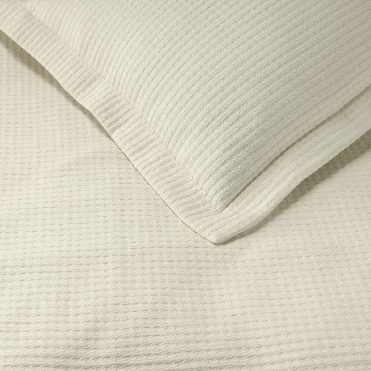 Clear Detail of Sferra Hatteras Coverlet and Shams Ivory