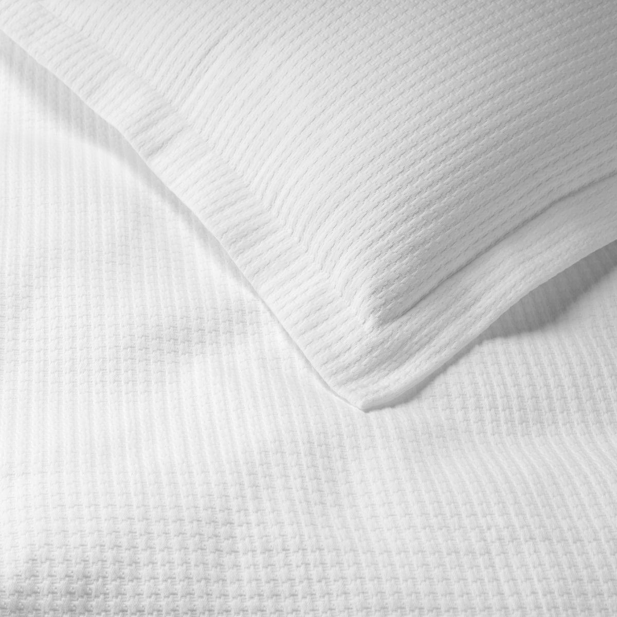 Clear Detail of Sferra Hatteras Coverlet and Shams White