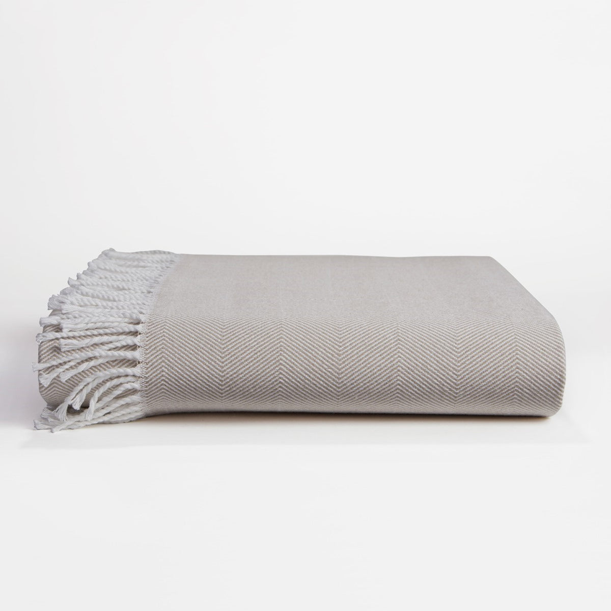 Clear Image of Downtown Company Herringbone Throw Charcoal in Taupe White Color