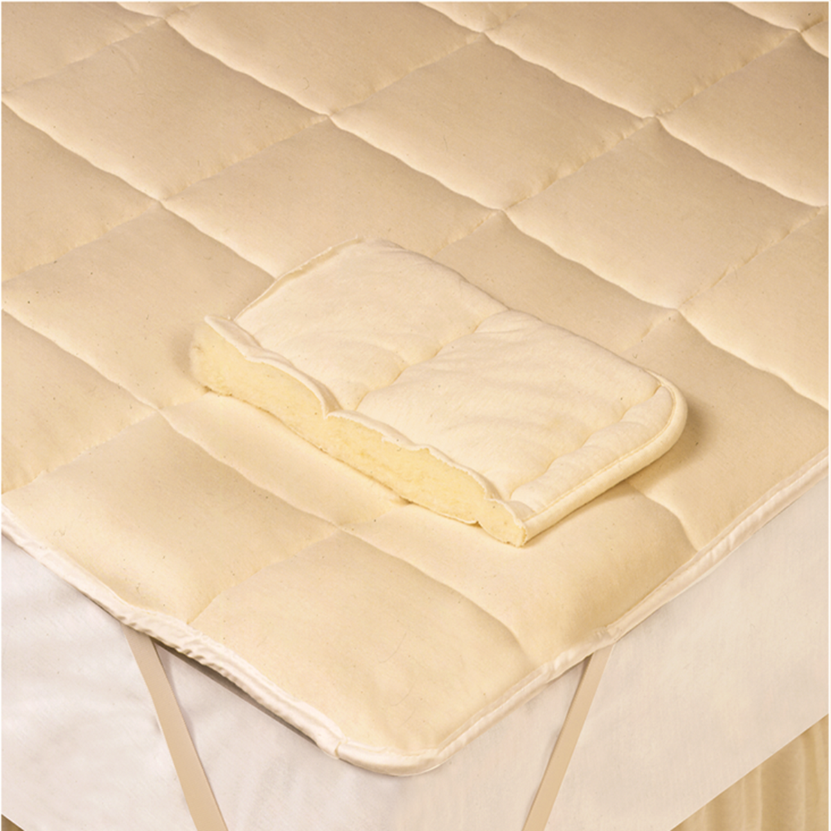 Closeup View of Downtown Company Wool Filled Mattress Pad in Natural Color
