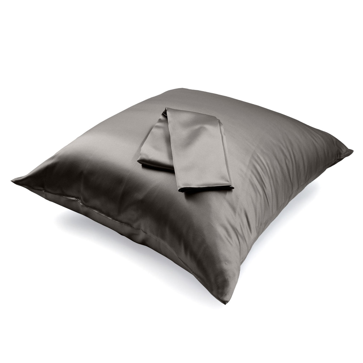 Mulberry silk Euro sham pillowcase folded on a pillow, showing fabric texture and craftsmanship
