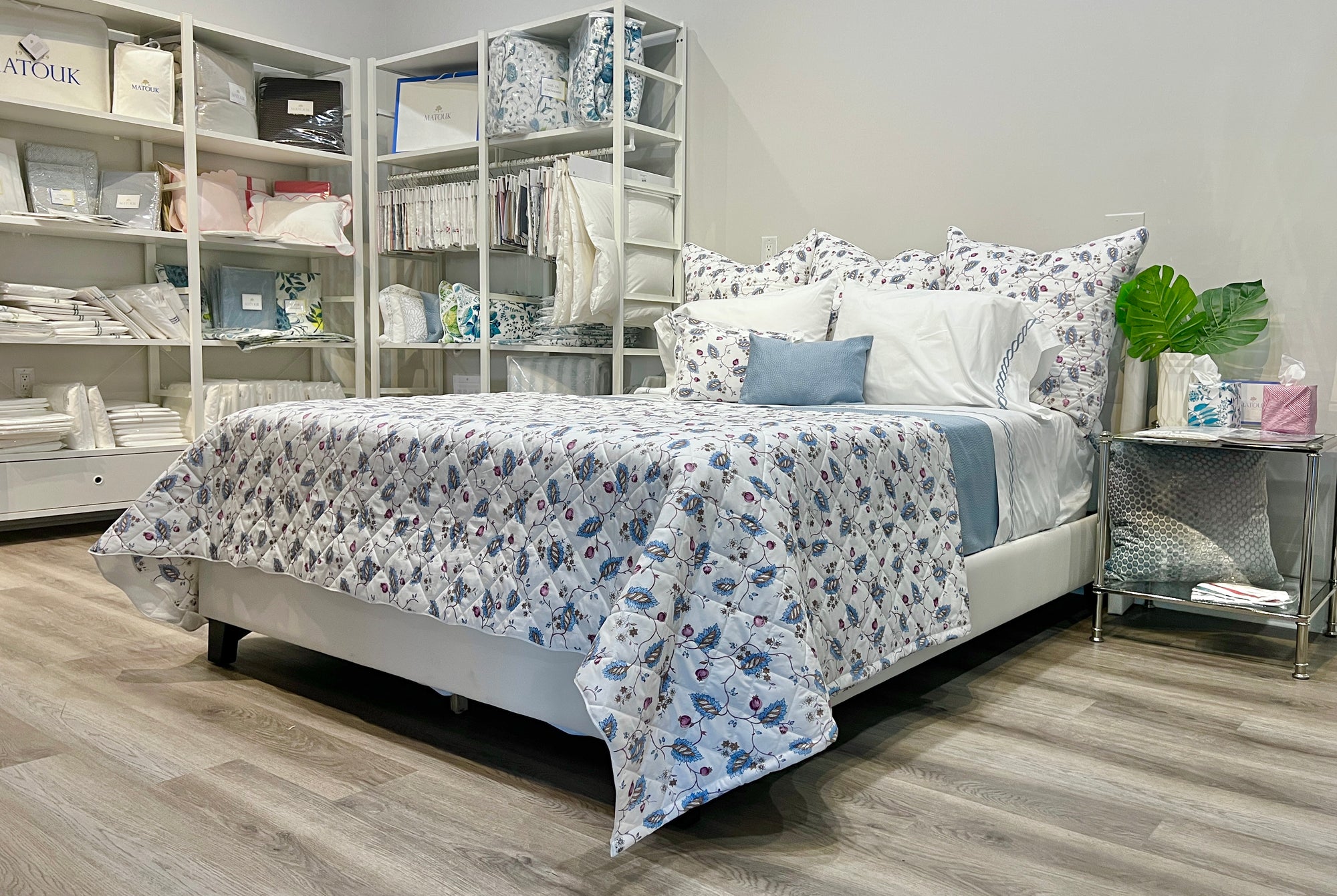 A beautiful bed in a showroom setting