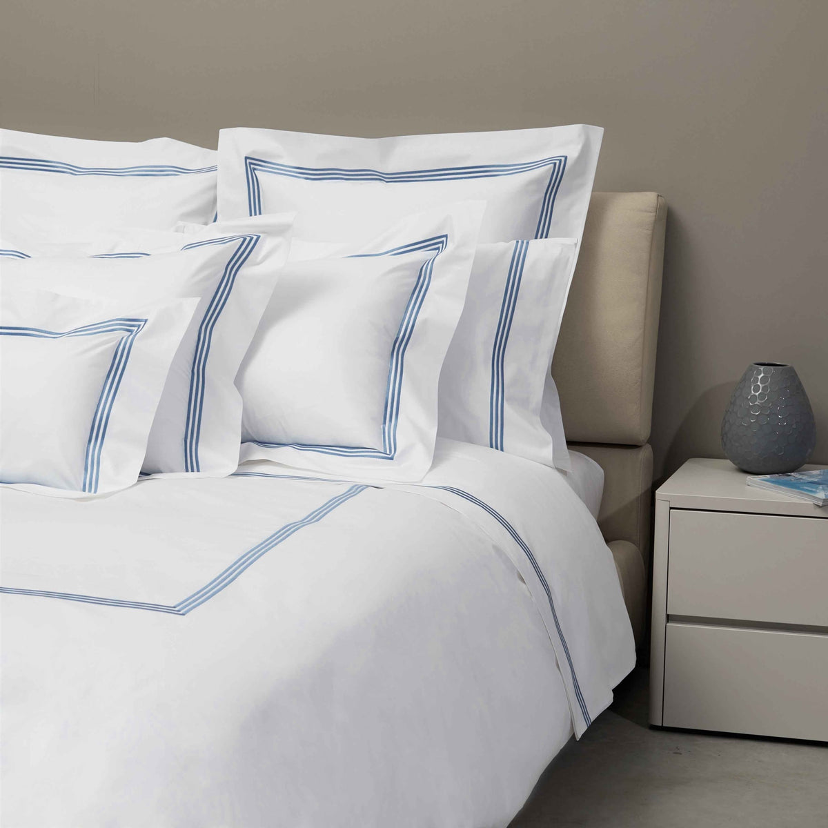 Bed Dressed in Signoria Platinum Percale Bedding in White/Airforce Blue Color