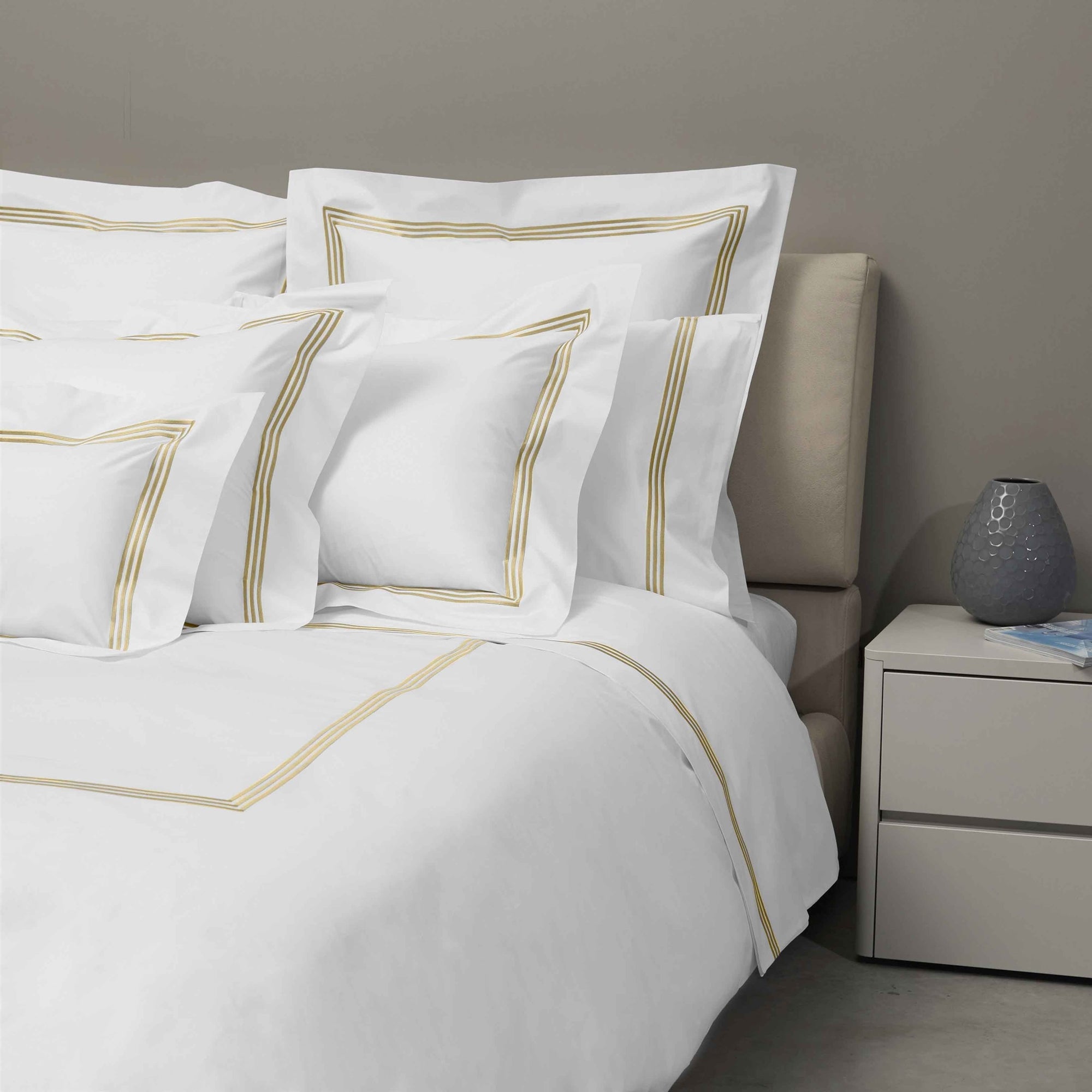 Bed Dressed in Signoria Platinum Percale Bedding in White/Caramel Color