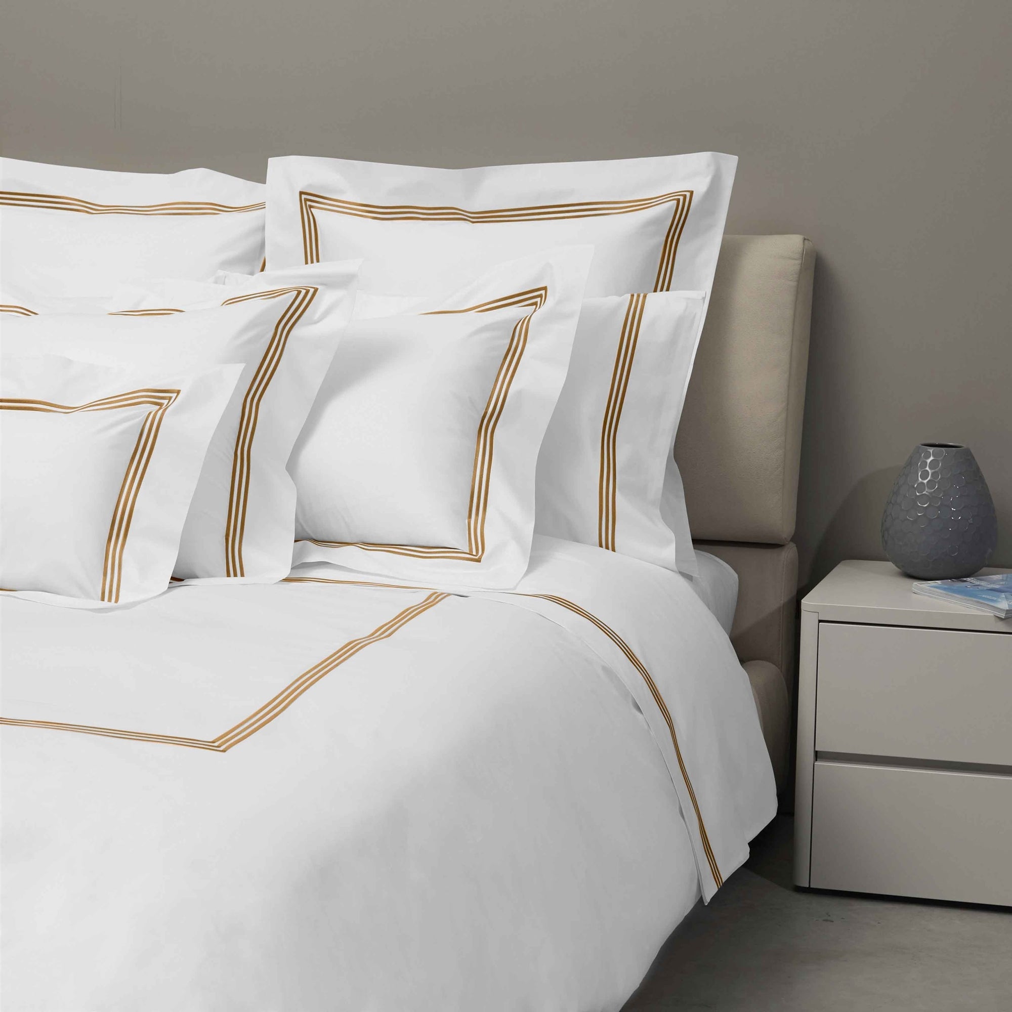 Bed Dressed in Signoria Platinum Percale Bedding in White/Cognac Color