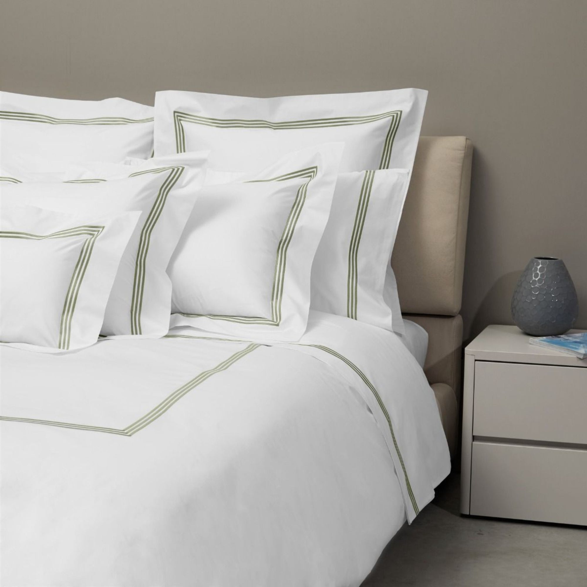 Bed Dressed in Signoria Platinum Percale Bedding in White/Olive Green Color