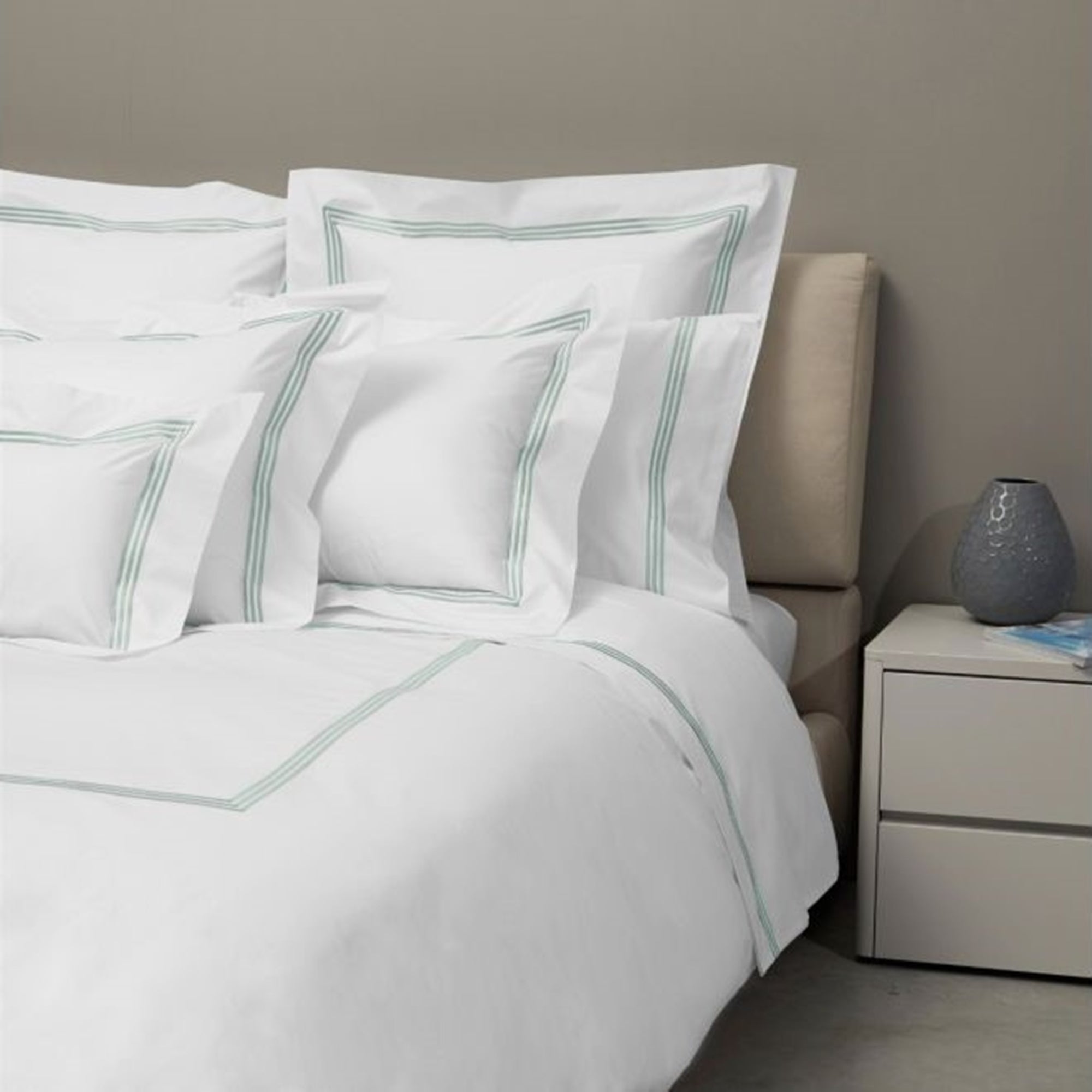 Bed Dressed in Signoria Platinum Percale Bedding in White/Silver Sage Color