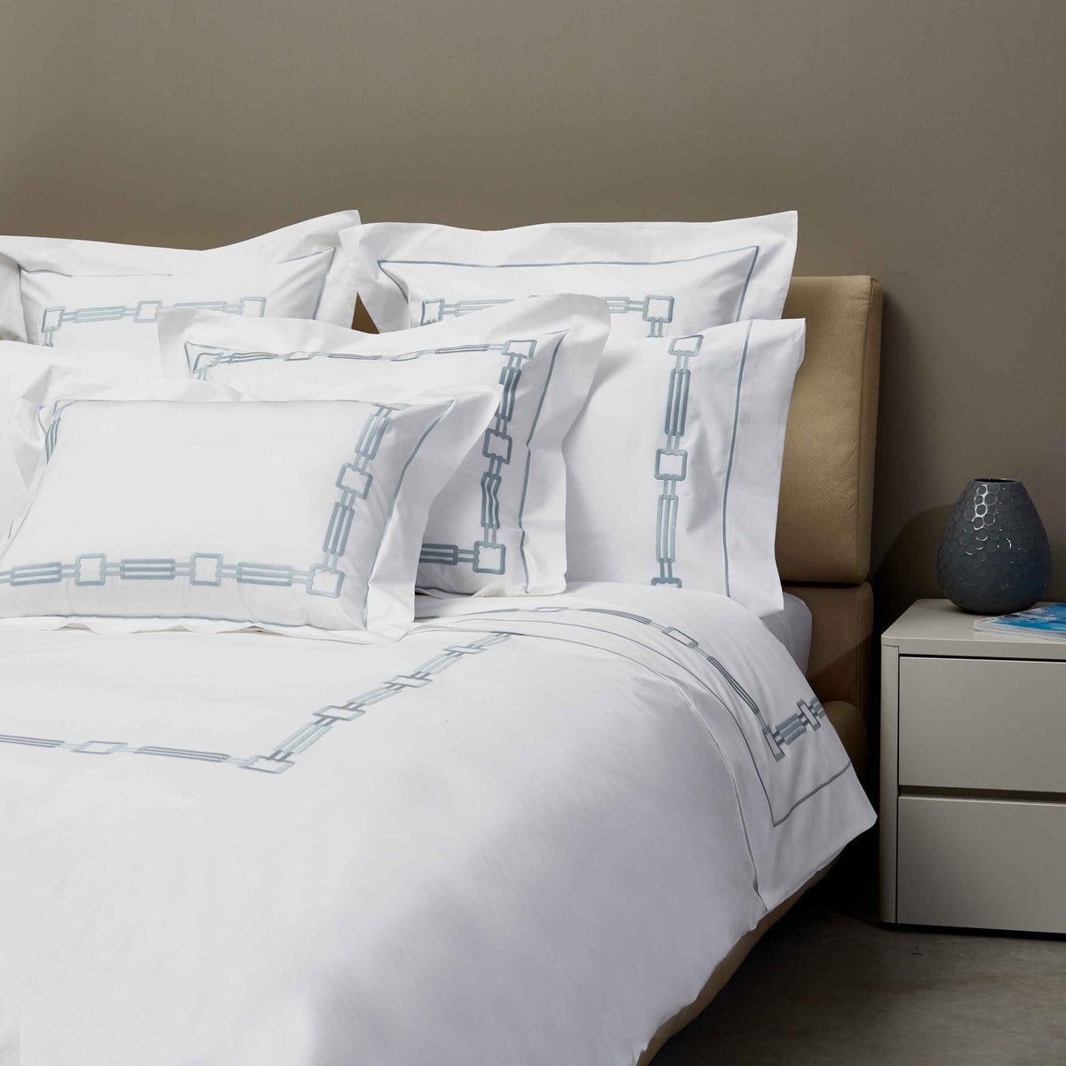 Closeup View of Signoria Retrò Bedding in White/Wilton Blue Color