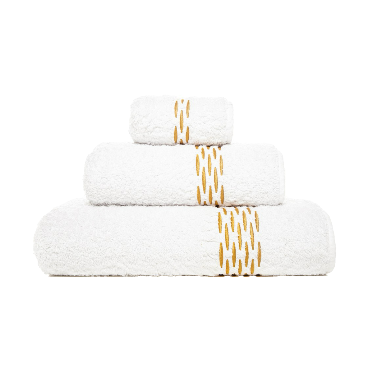 Stack of White Gold Graccioza Alhambra Bath Towels
