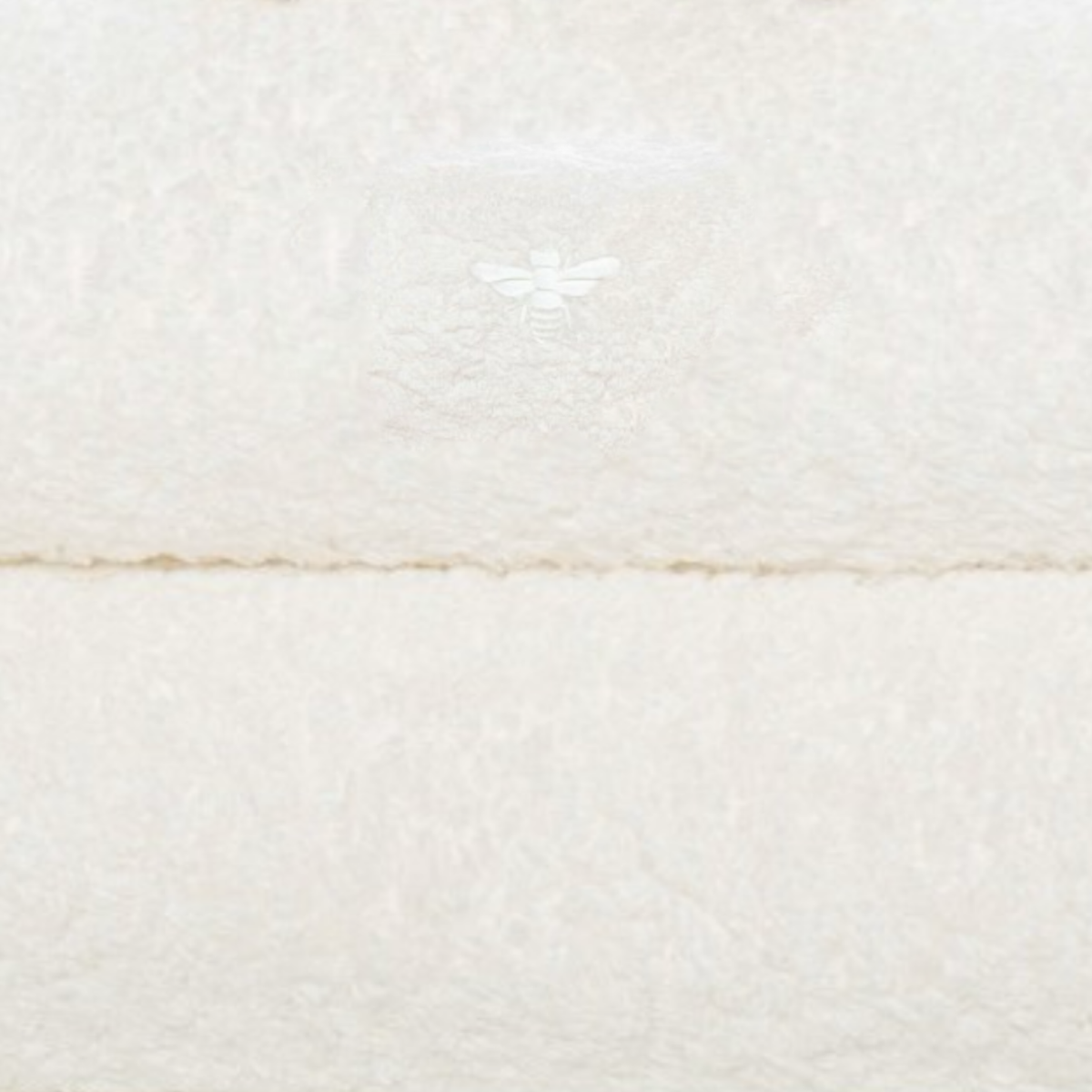 Fabric Closeup of Graccioza Apiary Bath Towels and Rugs