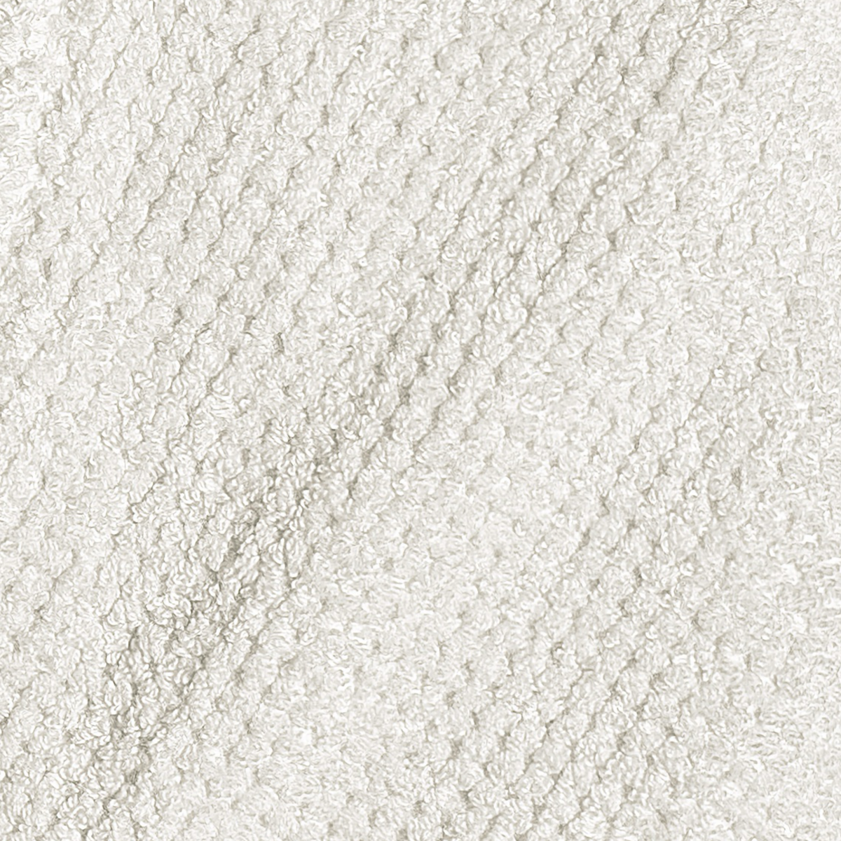 Closeup of Graccioza Bee Waffle Bath Fabric in Snow color
