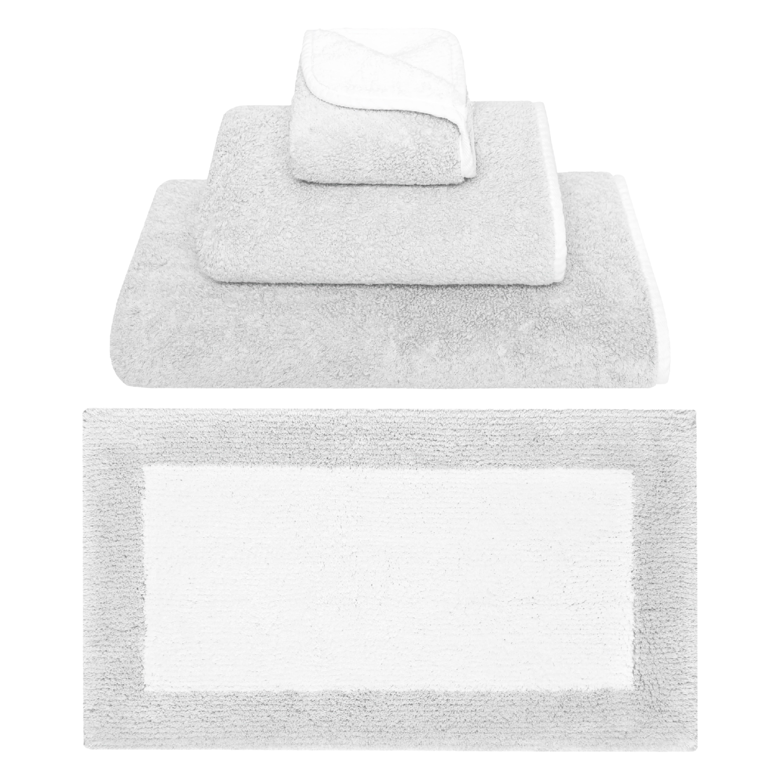Stack of Graccioza Bicolore Bath Towels and Rug in Cloud and White