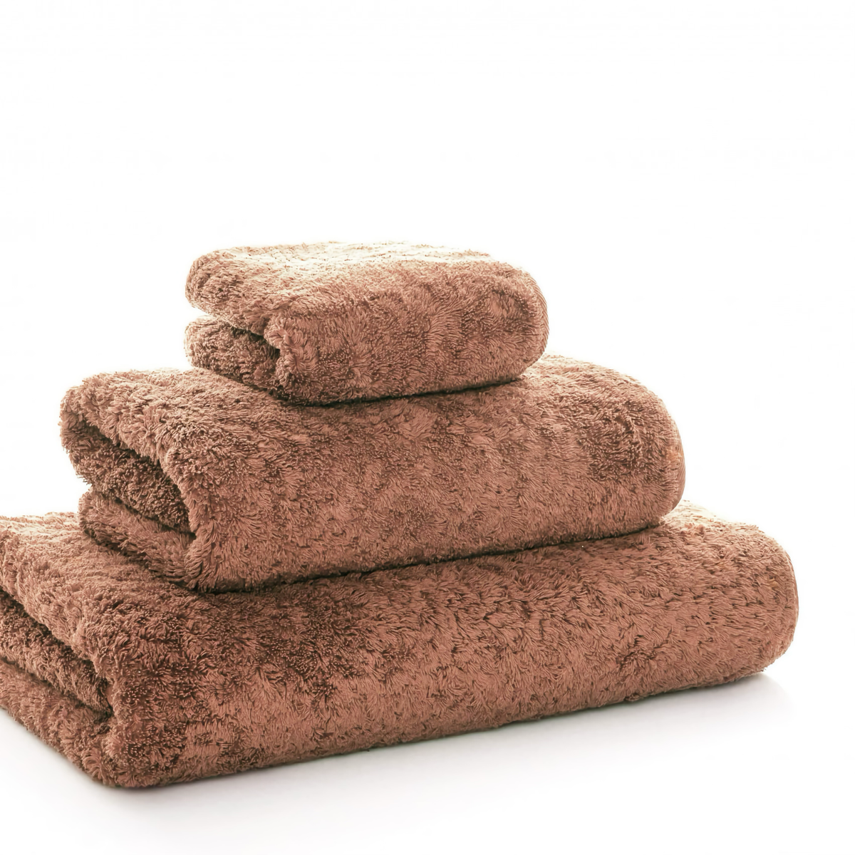 Corner View of Graccioza Egoist Bath Towels in Earth color