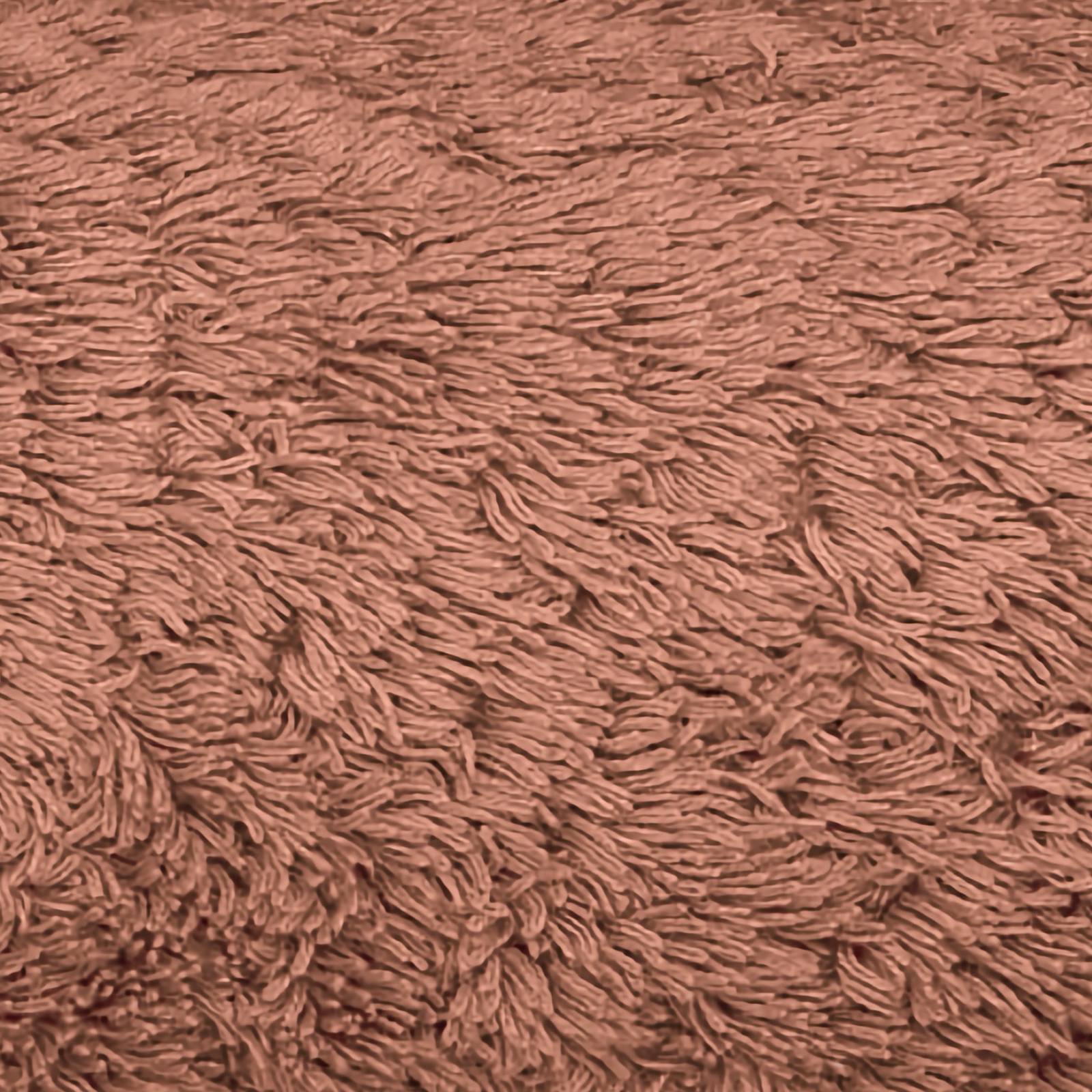 Stack of Graccioza Egoist Bath Towels in Earth color