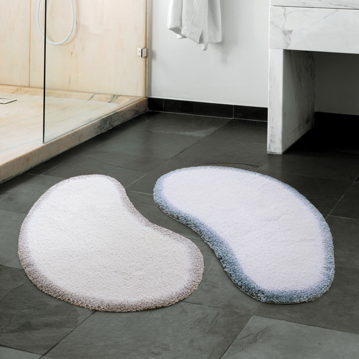 Two Maiko Bath Rugs on bath floor