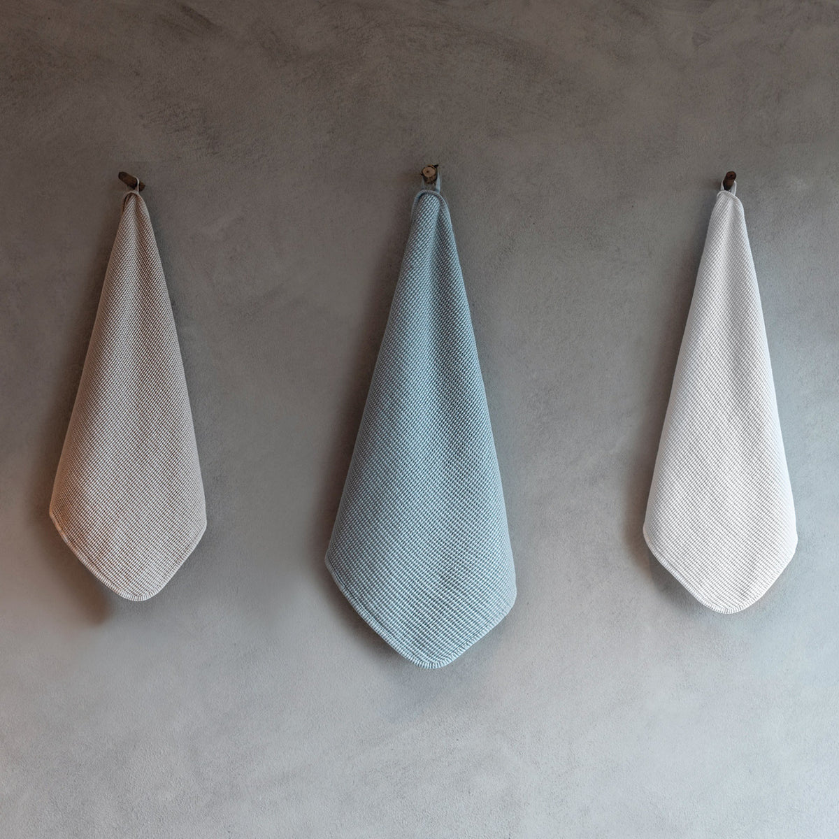 Hanging Graccioza Melody Bath Linens in Different Colors
