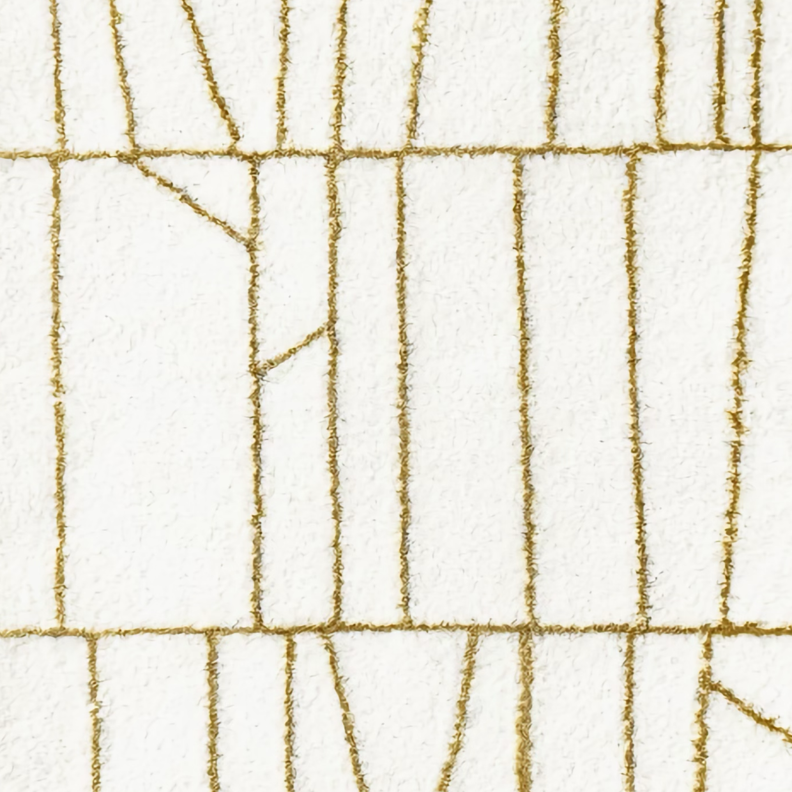 Gold Graccioza Modest Bath Rug beside a luxurious bath tub