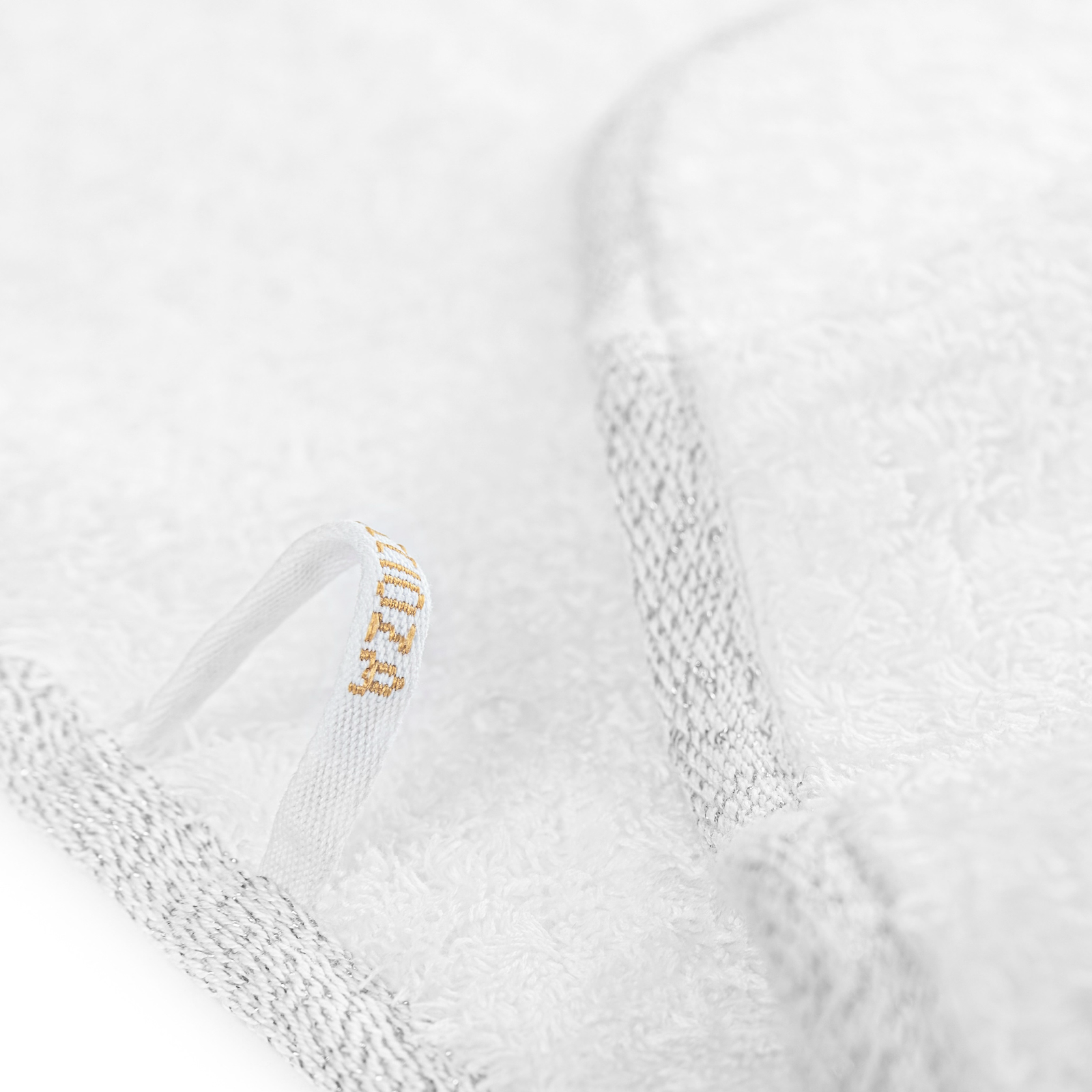 Stack of Graccioza Parson Bath Towels in White and Silver