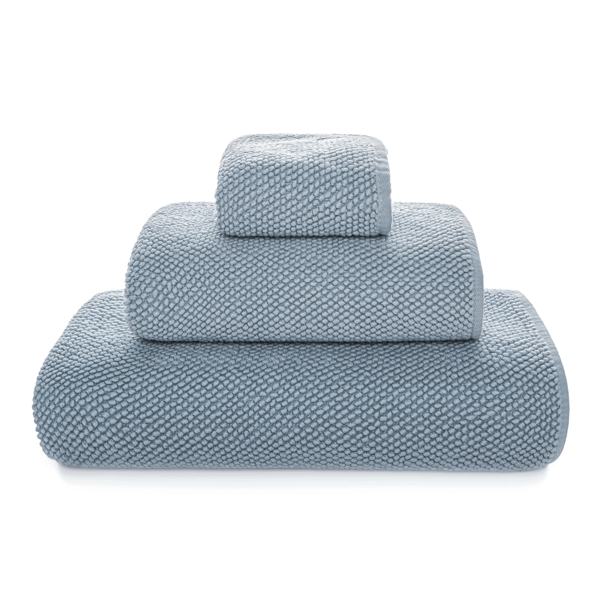 Stack of Graccioza Pearls Bath Towels in French Blue color
