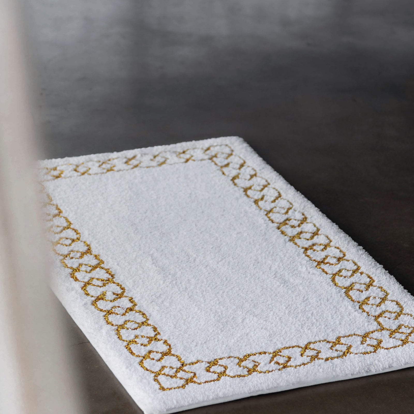 Lifestyle Shot of Graccioza Sophia Bath Rugs in Gold Color