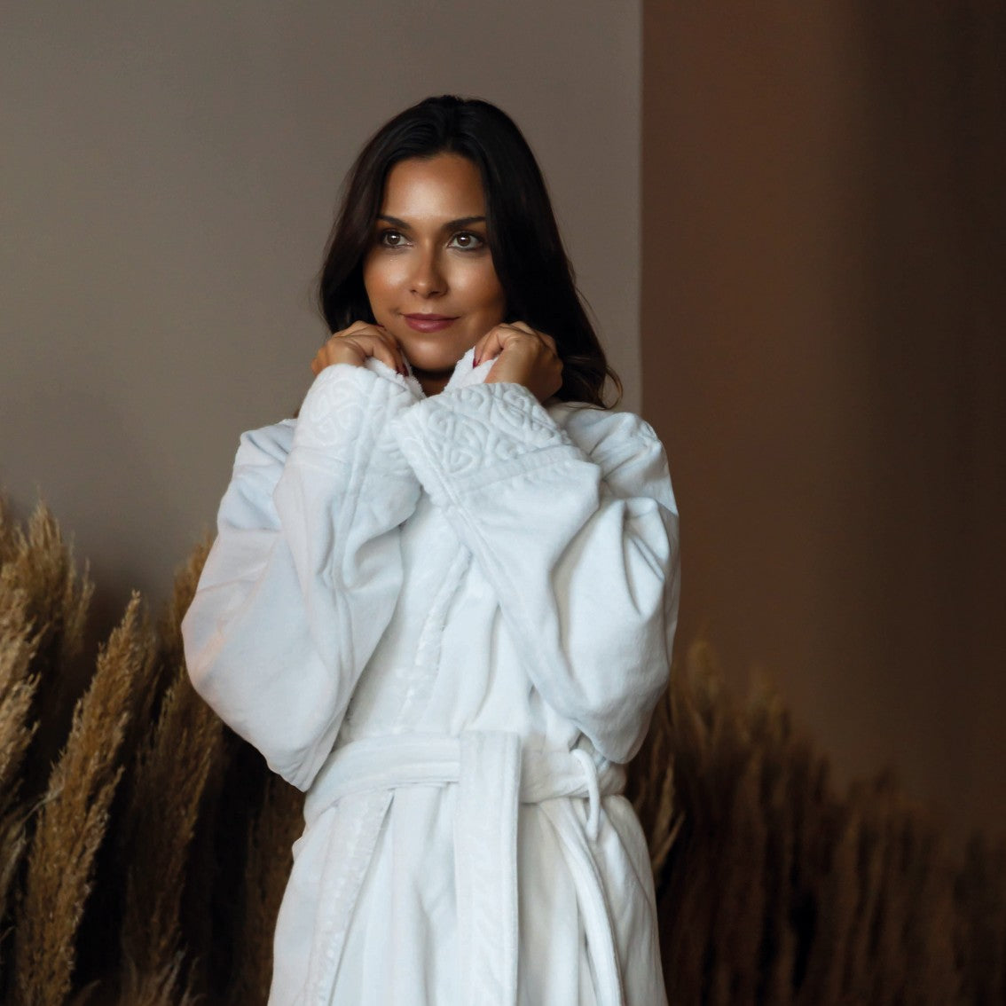 brunette model wearing a Graccioza Grand Egoist Bath Robe