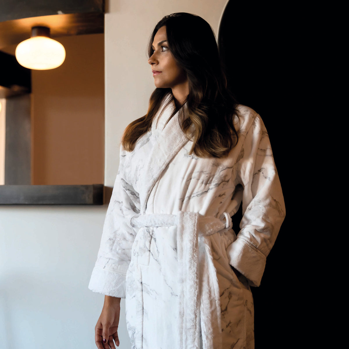 dark haired woman wearing a Graccioza Mabel bathrobe