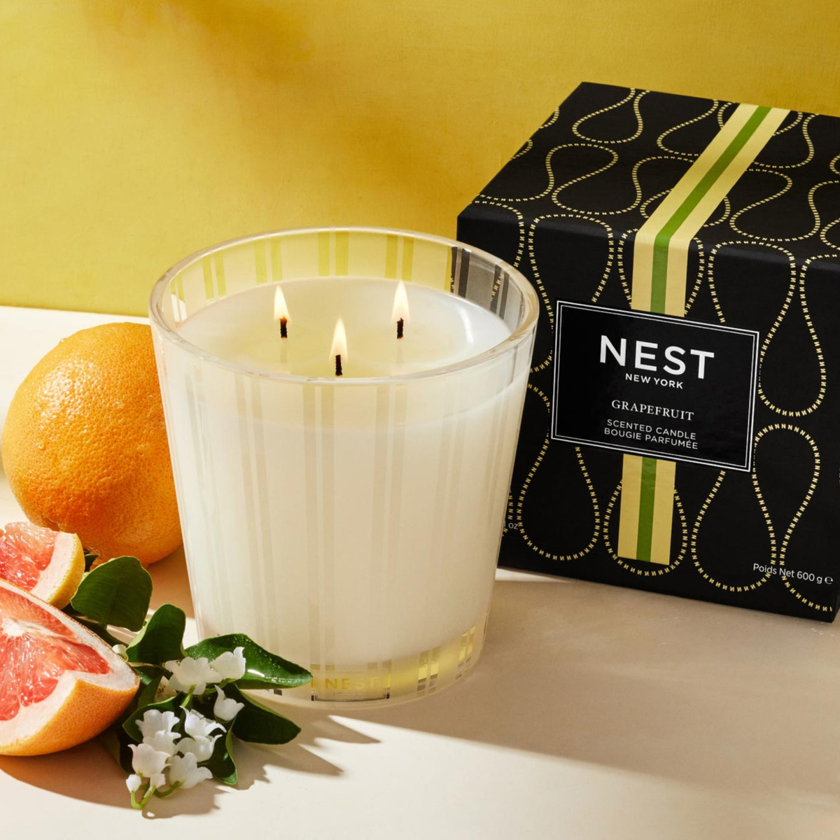 Topview Lifestyle Photo of Nest New York’s Grapefruit 3-Wick Candle