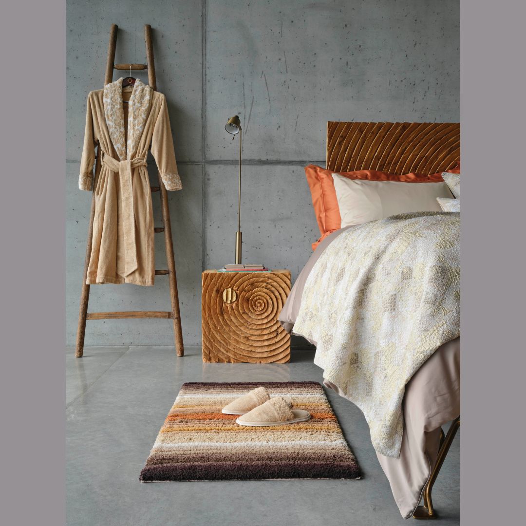 Habidecor Santa Cruz Bath Rug - lifestyle bedroom image - Caramel