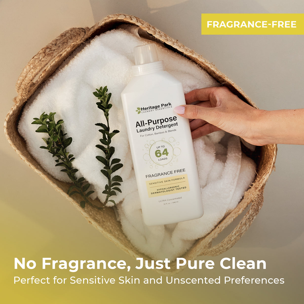 Hand holding a bottle of Heritage Park All-Purpose Laundry Detergent in a woven basket with text highlighting fragrance-free properties.
