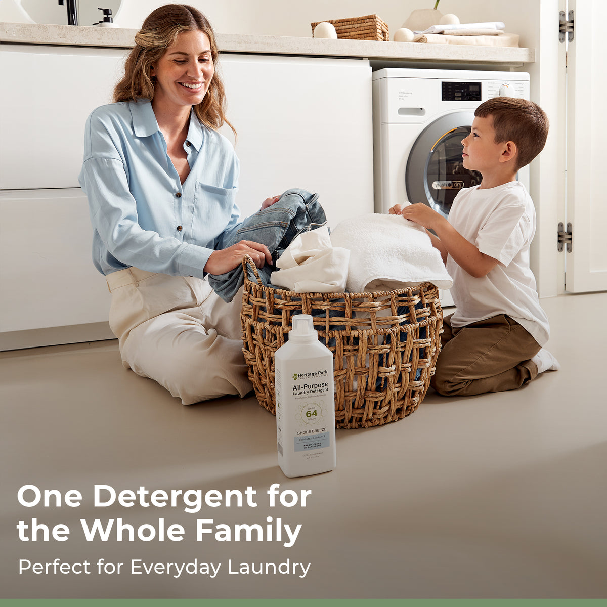 Woman and child with laundry basket in kitchen, Heritage Park Shore Breeze All Purpose detergent bottle in foreground