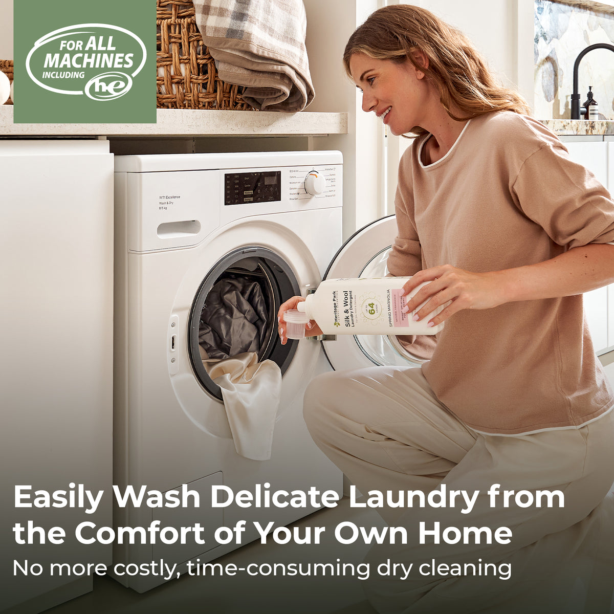 Woman in a laundry room with a washing machine, holding a Heritage Park Silk and Wool Spring Magnolia 32oz bottle